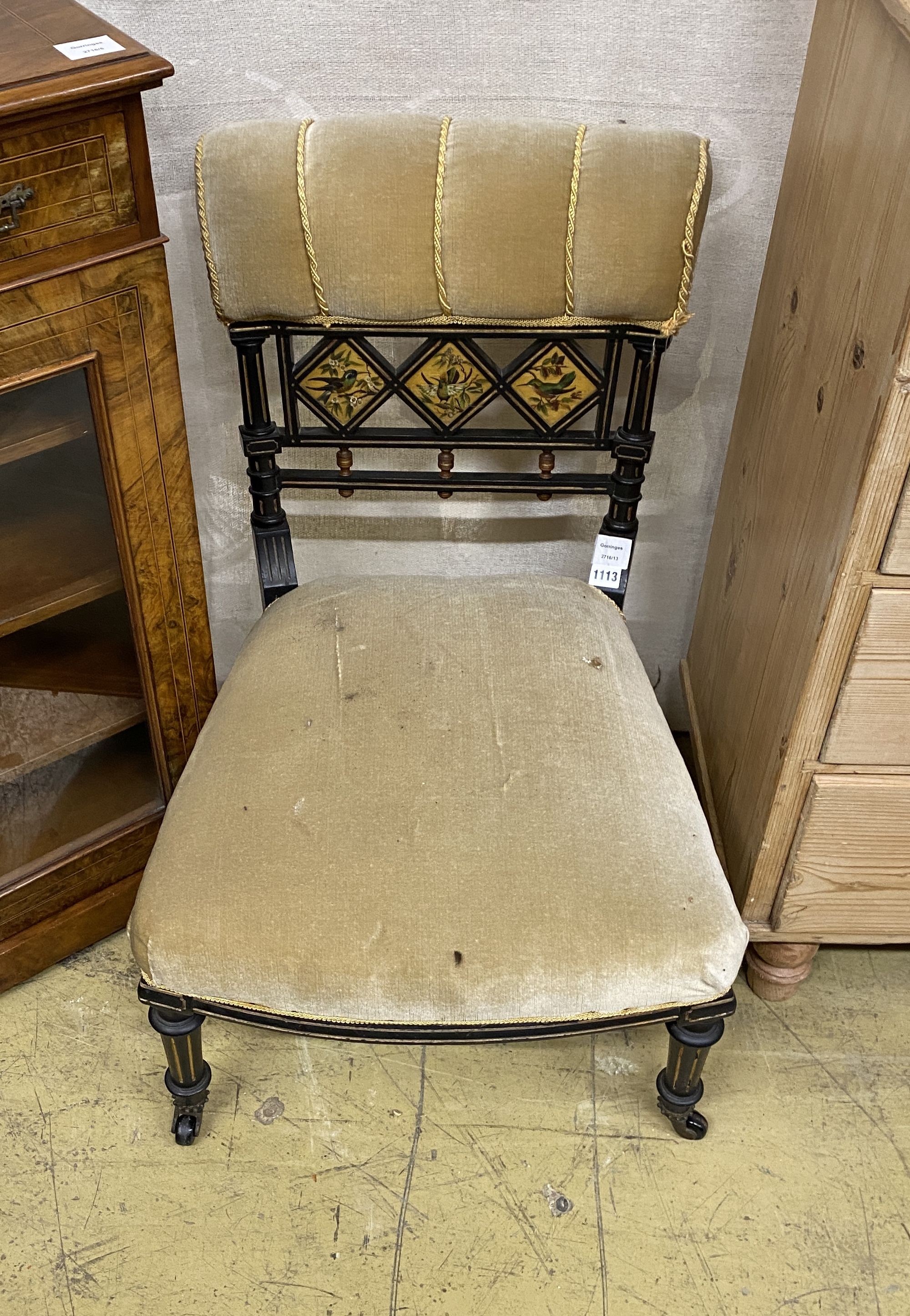 A late Victorian Aesthetic Movement painted ebonised salon chair decorated with song birds, width 50cm, depth 50cm, height 76cm